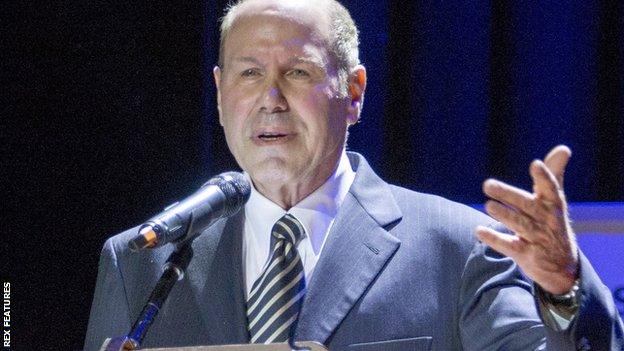 Michael Eisner addresses a meeting of Portsmouth FC shareholders at Portsmouth Guildhall