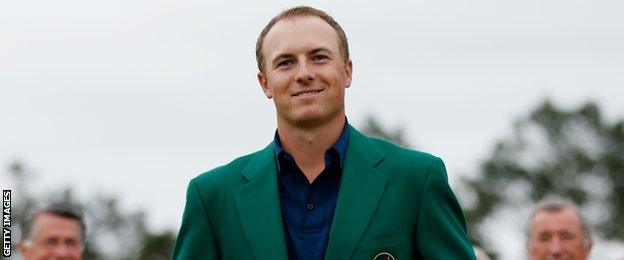 Jordan Spieth with the famous green jacket for winning The Masters