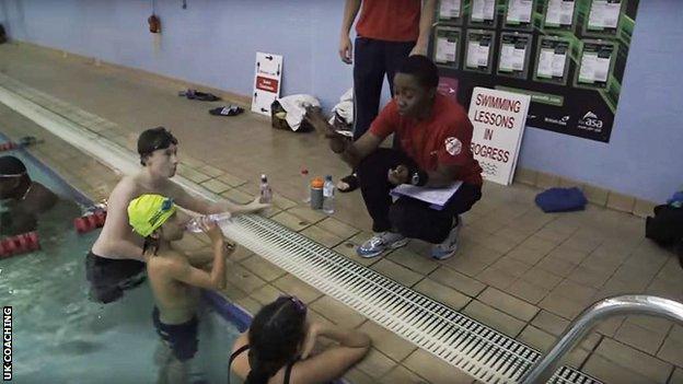 Bisi Imafidon taking a swimming lesson