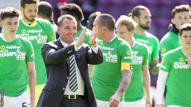 Celtic manager Brendan Rodgers applauds visiting fans at Tynecastle