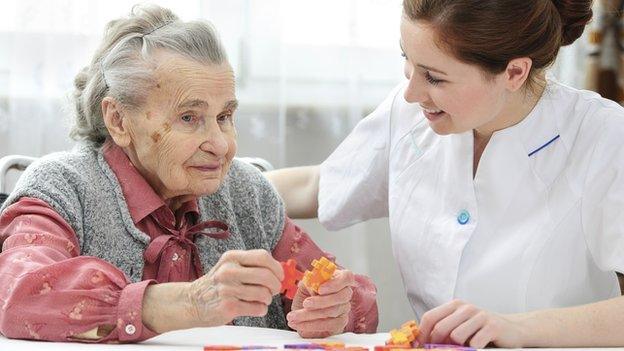 Carer with elderly woman