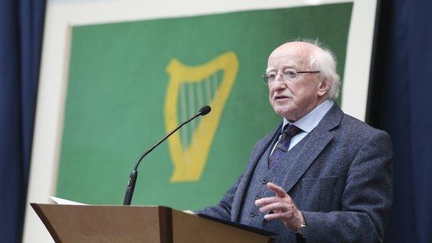 Irish President Michael D Higgins speaking at an event where the green harp flag was presented on loan from the Inniskillings Museum