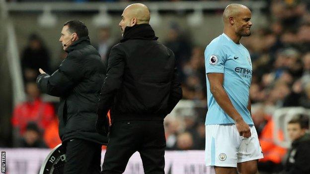 Vincent Kompany (right) walks off at Newcastle