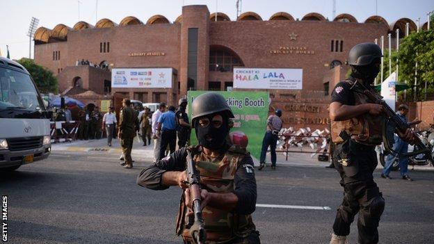 Police in Pakistan before a World XI practice session