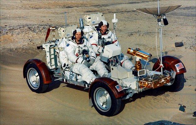 Duke and Young on Earth version of lunar rover