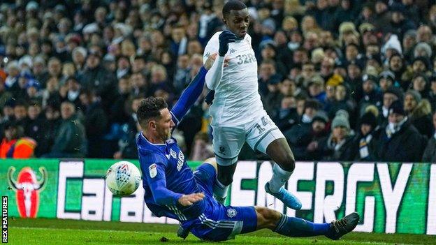 Cardiff City defender Sean Morrison fouls Leeds United forward Eddie Nketiah