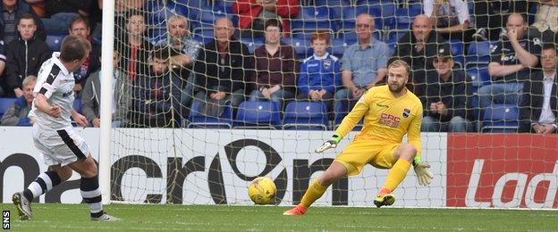 Dundee's Paul McGowan scores from the penalty spot making it 3-0