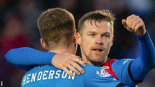 Inverness' Billy McKay celebrates scoring to make it 3-1