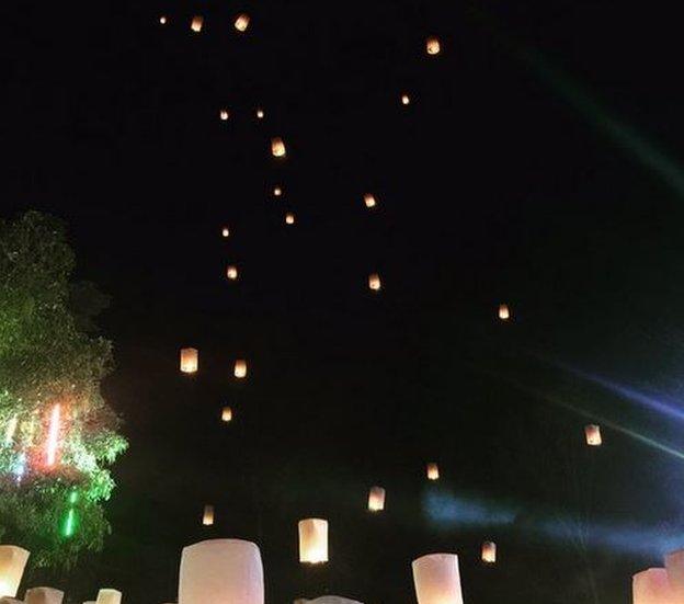 Lanterns in the night sky in Thailand