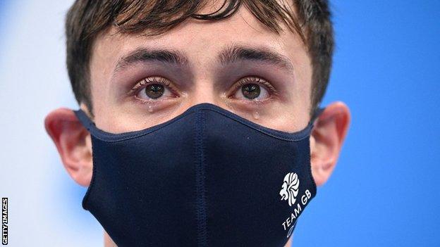 Tom Daley in tears on the podium