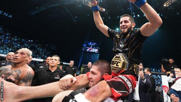 Islam Makhachev celebrating his win over Charles Oliveira