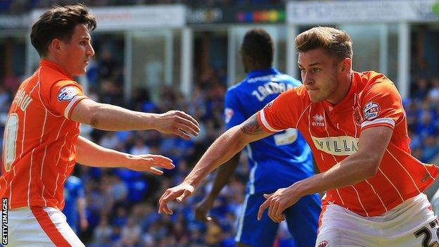 Jacob Blyth (right) celebrates scoring for Blackpool