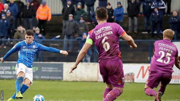 Coleraine' Ben Doherty has a shot against Linfield