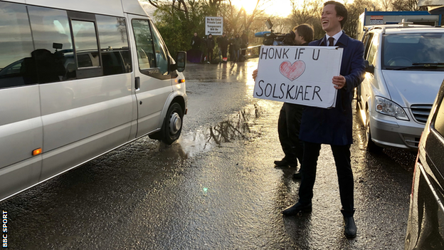 A Norwegian broadcaster held up a placard reading "Honk if you love Solskjaer" to all vehicles heading into United's training ground Carrington on Thursday morning