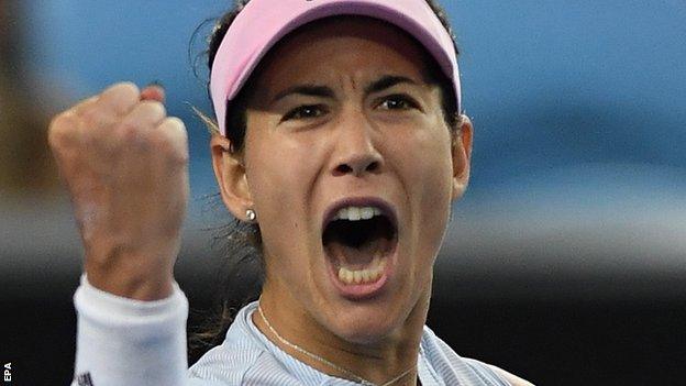 Garbine Muguruza celebrates beating Johanna Konta