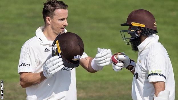 Tom Curran and Hashim Amla