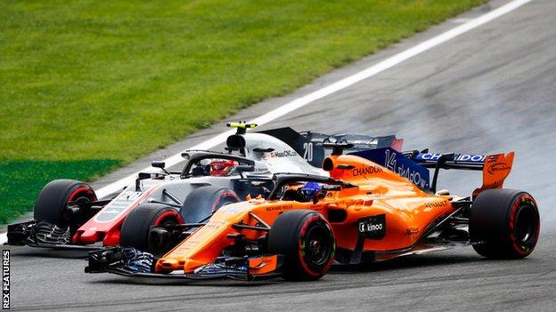 Kevin Magnussen and Fernando Alonso clash on track during Italian GP qualifying