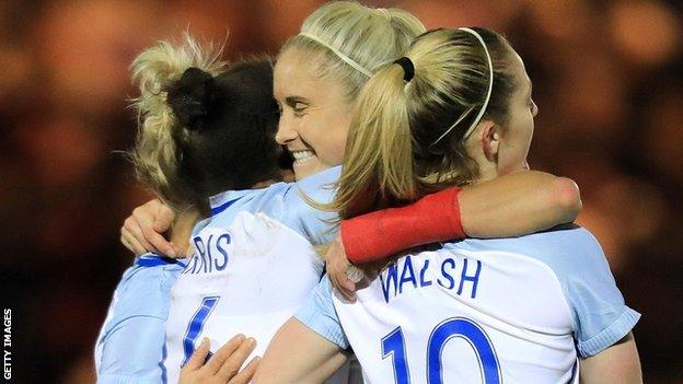 Nikita Parris and Keira Walsh celebrate with Steph Houghton