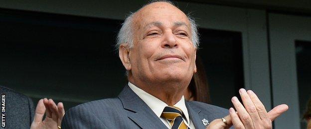 Hull City owner Assem Allam applauds and smiles following a Premier League game against Burnley in May 2015