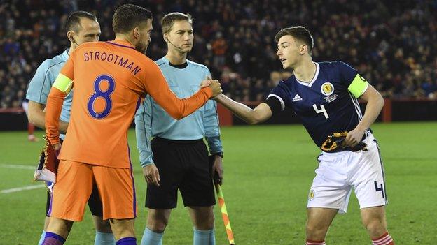 Netherlands captain Kevin Strootman and Scotland captain Kieran Tierney