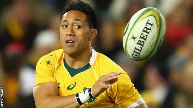 Christian Lealiifano throws a pass during the game against England in Melbourne last year