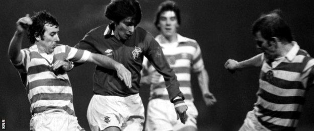 Celtic's Andy Lynch (left) and Johannes Edvaldsson (right) squeeze out Gordon Smith of Rangers