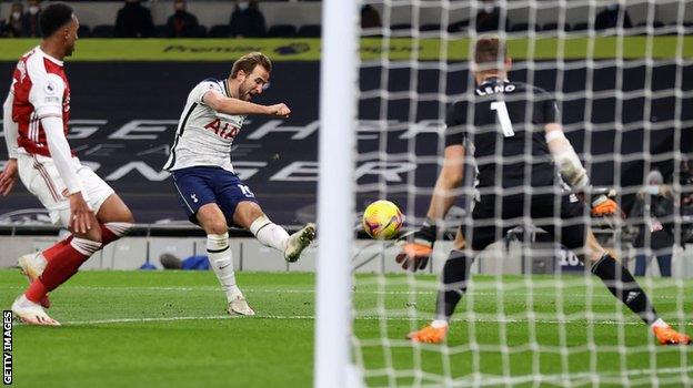 Harry Kane scores against Arsenal