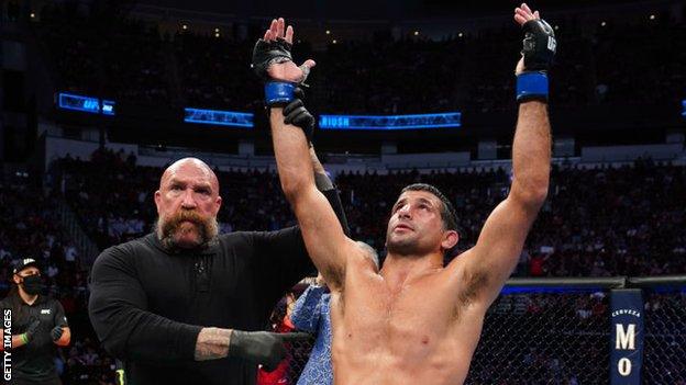 Beneil Dariush celebrates after beating Tony Ferguson in their lightweight bout at UFC 262