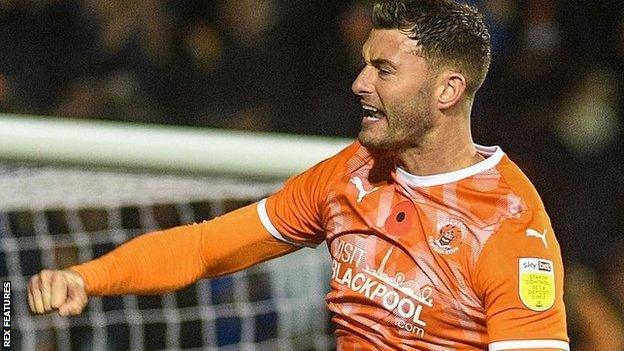 Gary Madine celebrates