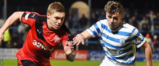 Morton's Mark Russell (right) in action against Rangers