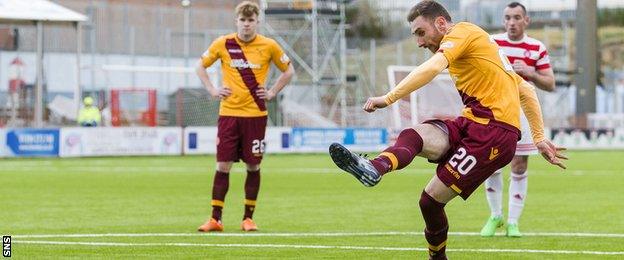 Louis Moult takes a penalty