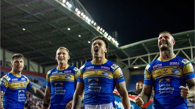 Tom Briscoe, Mikolaj Oledzki, Zane Tetevano and Zak Hardaker celebrate Leeds reaching the Grand Final