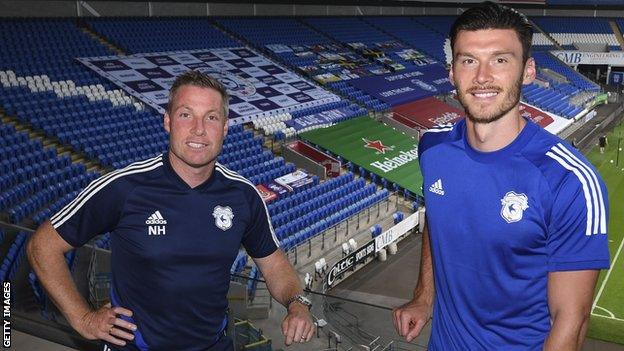 Neil Harris (left) with Kieffer Moore