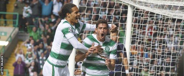 Virgil van Dijk congratulates Nir Bitton on scoring Celtic's second goal after 10 minutes