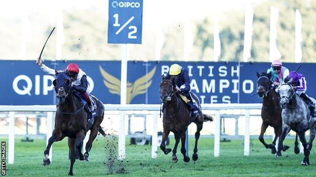 Frankie Dettori celebrates winning the Champions Stakes on Cracksman