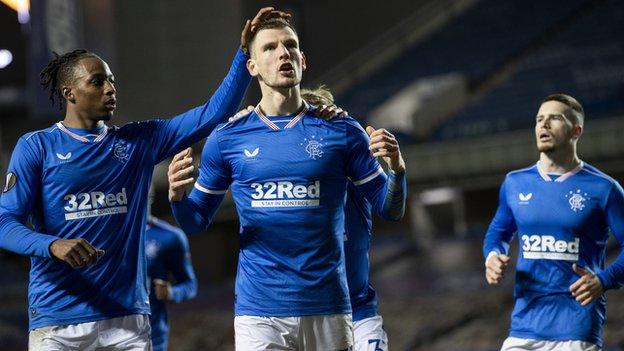 Rangers player celebrate v Antwerp