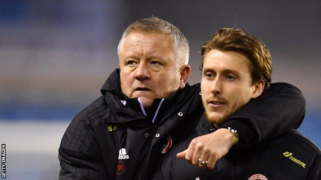 Luke Freeman (right) made 16 appearances in all competitions for Chris Wilder's (left) Sheffield United last season