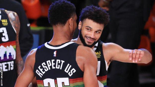 Denver Nuggets Jamal Murray and PJ Dozier embrace