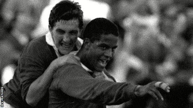 Robert Jones joins Jeremy Guscott in celebrating the Lions centre's winning try in the second 1989 Test against Australia