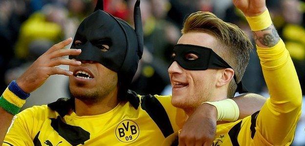 Borussia Dortmund players Pierre-Emerick Aubameyang and Marco Reus celebrate a goal