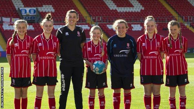 Amy Kay (third from left) heads up the female football pathway at Lincoln City