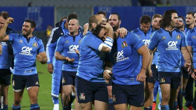 Italy celebrate their first ever victory over South Africa