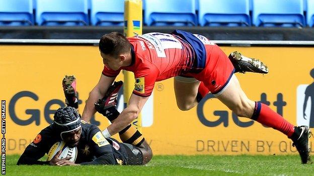 Wales international Josh Adams cannot prevent Wasps' once-capped England winger Christian Wade scoring in the right corner at the Ricoh Arena