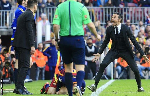 Barcelona manager Luis Enrique reacts to a foul on Lionel Messi