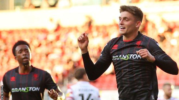 Charley Kendall celebrates scoring for Lincoln City