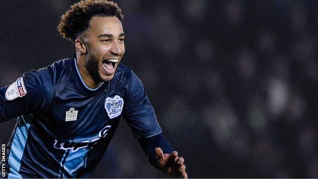 Nicky Maynard celebrates a goal for Bury