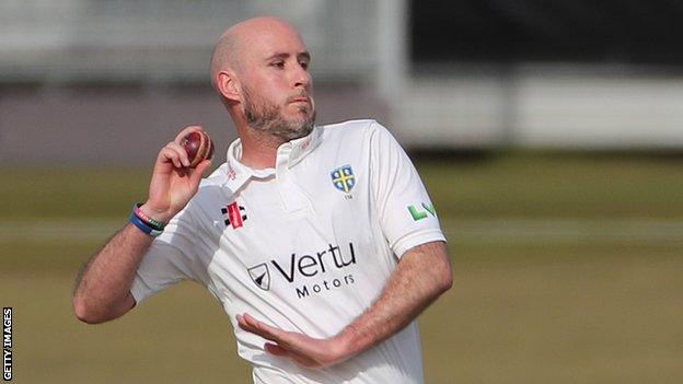 Chris Rushworth bowling for Durham