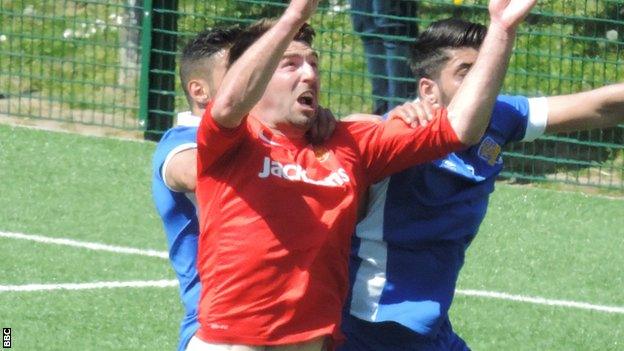 Craig Russell in action against Panjab FA