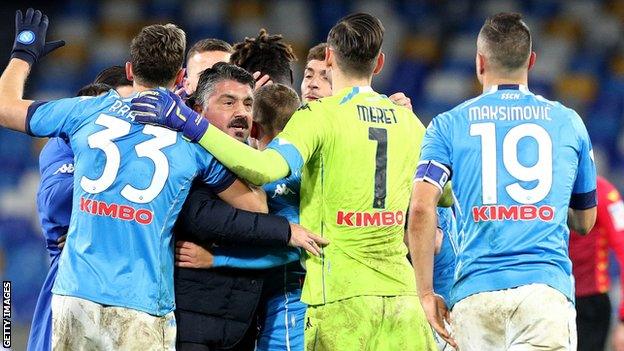 Napoli players celebrate with Gennaro Gattuso