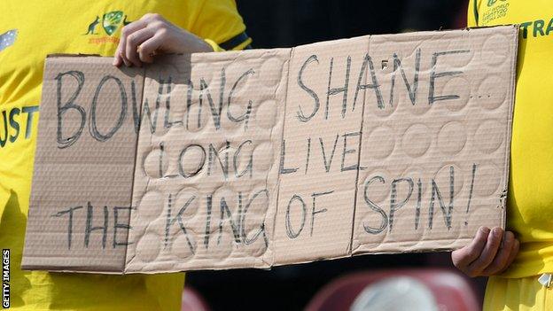 A sign with 'bowling, Shane' - Adam Gilchrist's iconic catchphrase - held by Australia fans